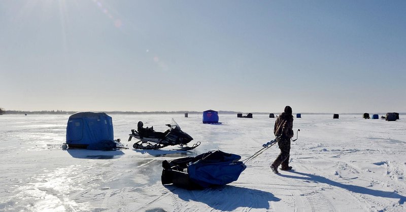 Ice fishing gambling game in Canada
